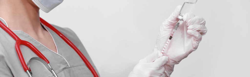 doctor preparing a rabies vaccinations shot